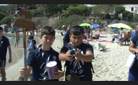 carloforte scout in spiaggia tra i bagnanti non buttate le cicche