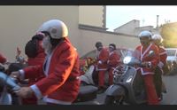 maracalagonis il babbo natale degli anziani arriva in vespa