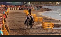 alghero spettacolo e tradizioni con le pariglie sulla spiaggia di san giovanni