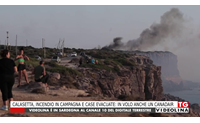 calasetta incendio in campagna e case evacuate in volo anche un canadair