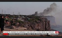 calasetta incendio in campagna e case evacuate in volo anche un canadair